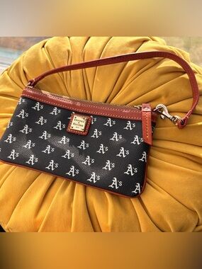 Dooney & Bourke Black Logo Wristlet with Brown Trim